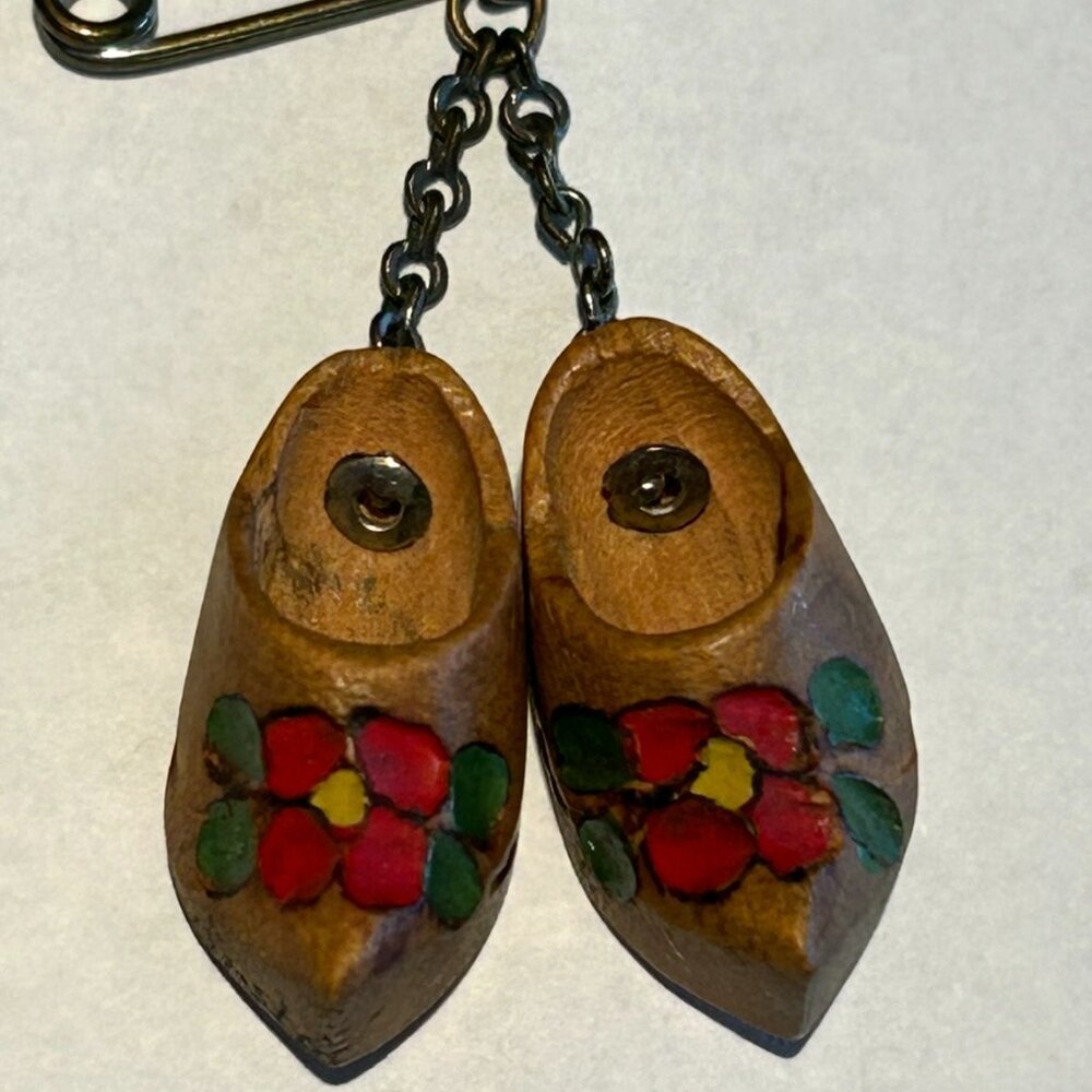 Vintage Norwegian Brooch featuring Wooden Clogs with Red Flowers